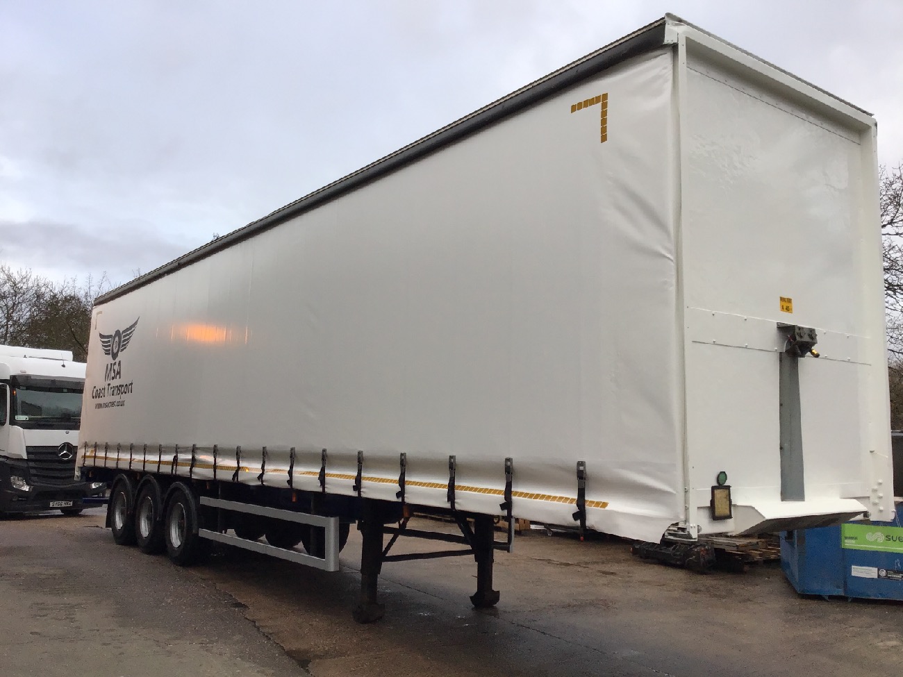 blue montracon trailer from front